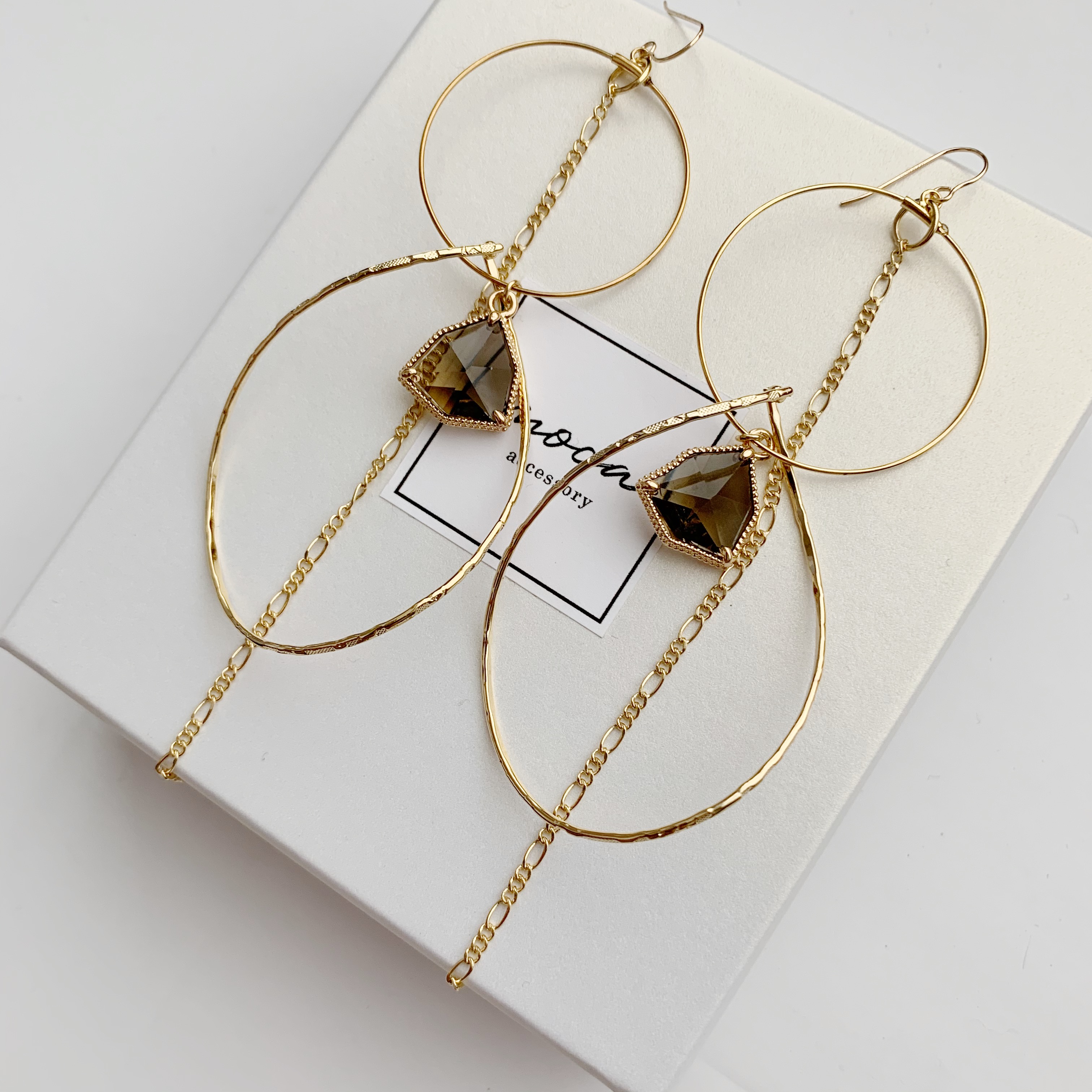 curve hoop × brown glas