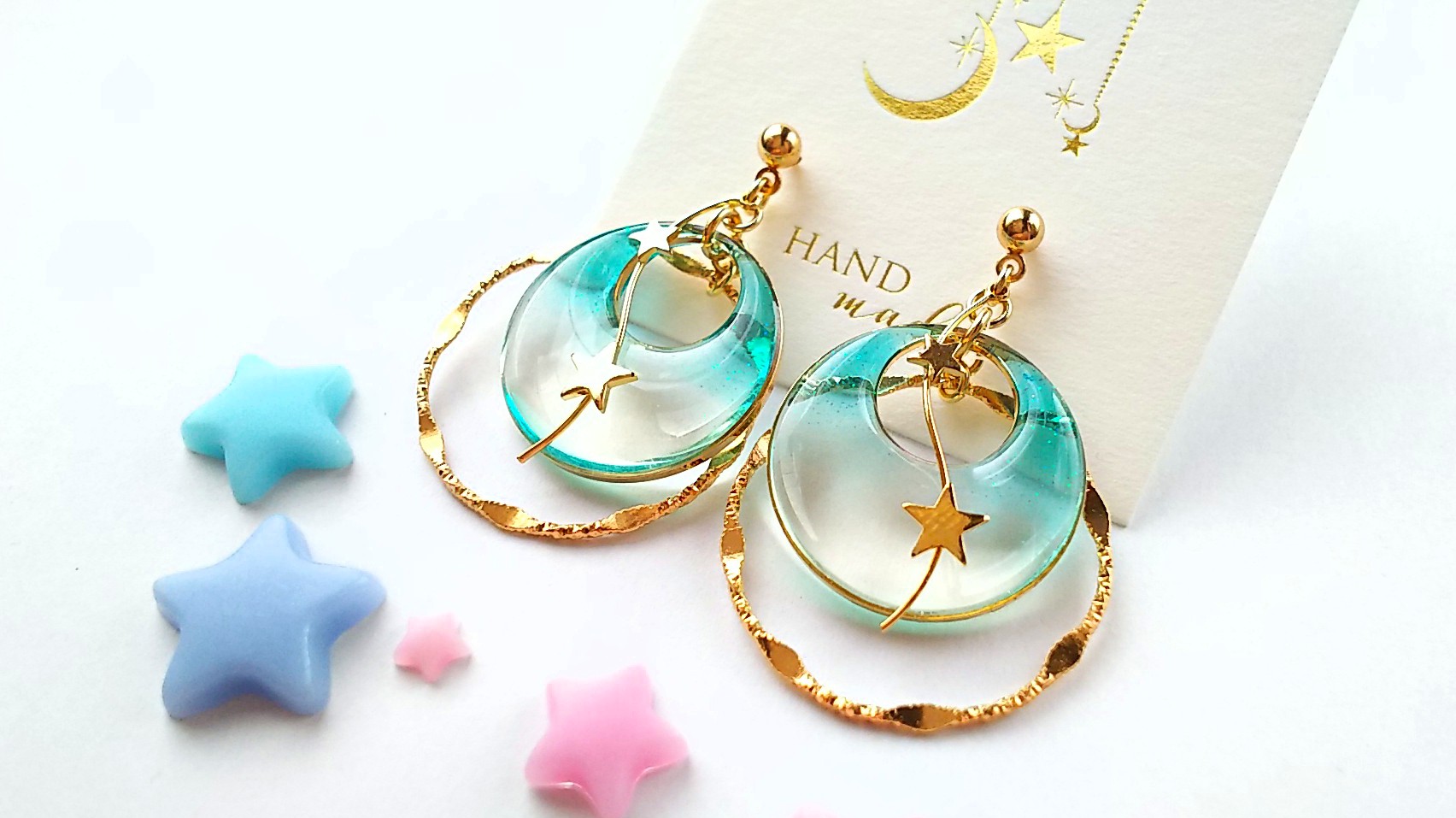 星が揺れるラウンド耳飾り（ブルー）