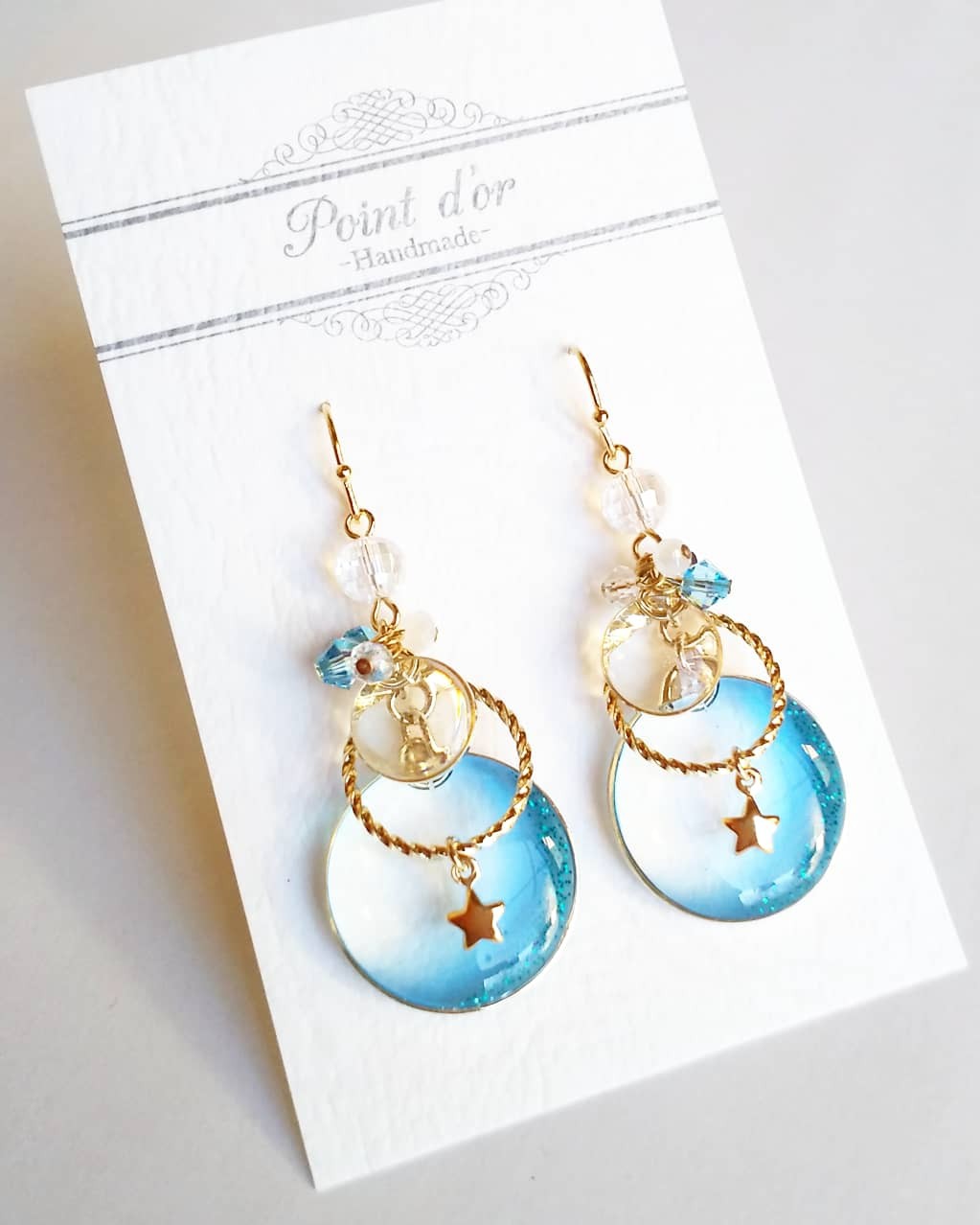 星が揺れるWラウンドフープピアスorイヤリングの画像2